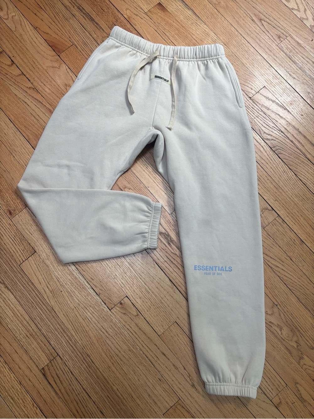 Fear of God Essentials sweatpants in a light beige Concrete L